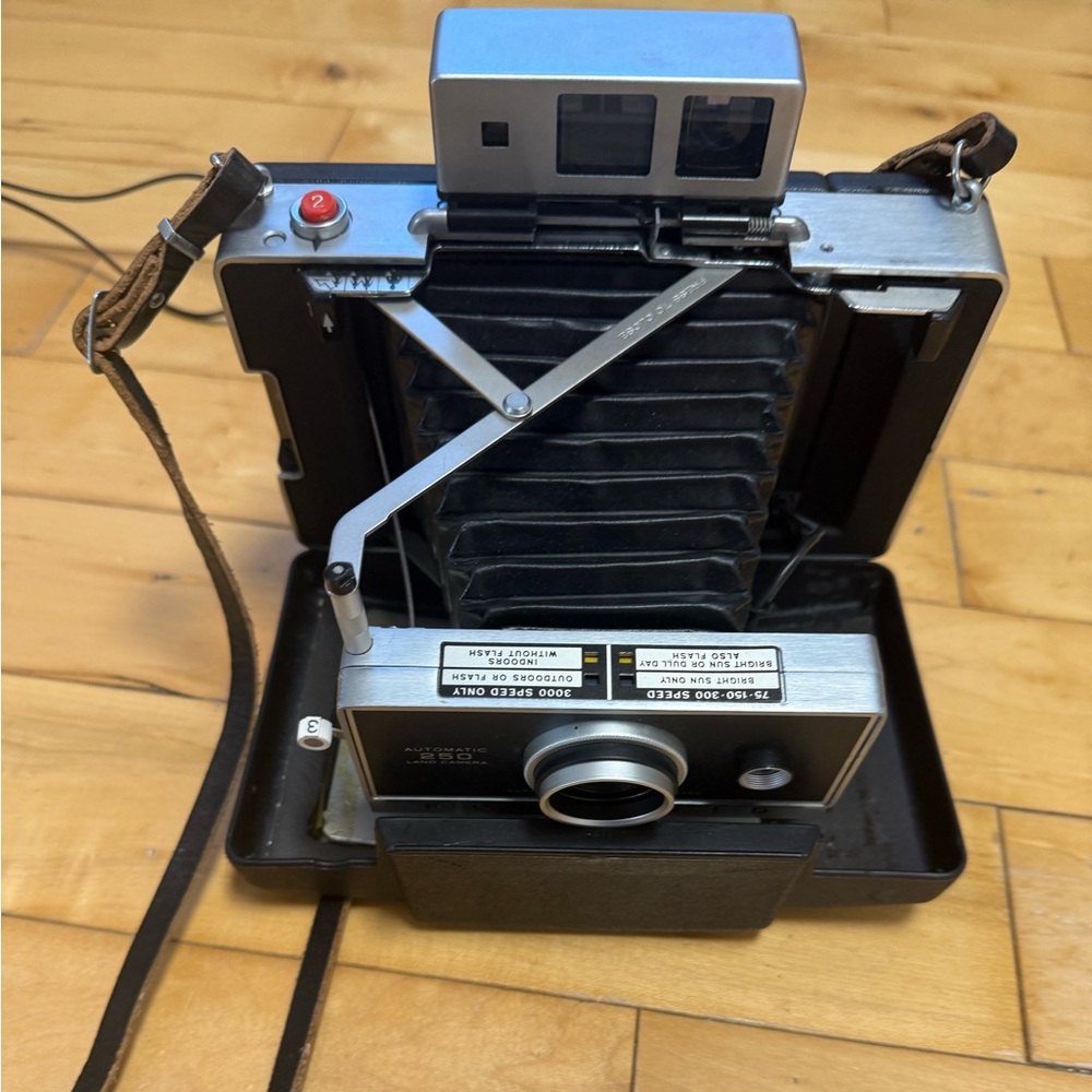 Polaroid Land Camera with Black and Silver Finish